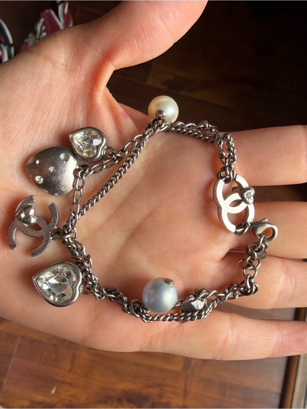 CHANEL Silver-Tone Charm Bracelet with Pearls and Crystal Hearts